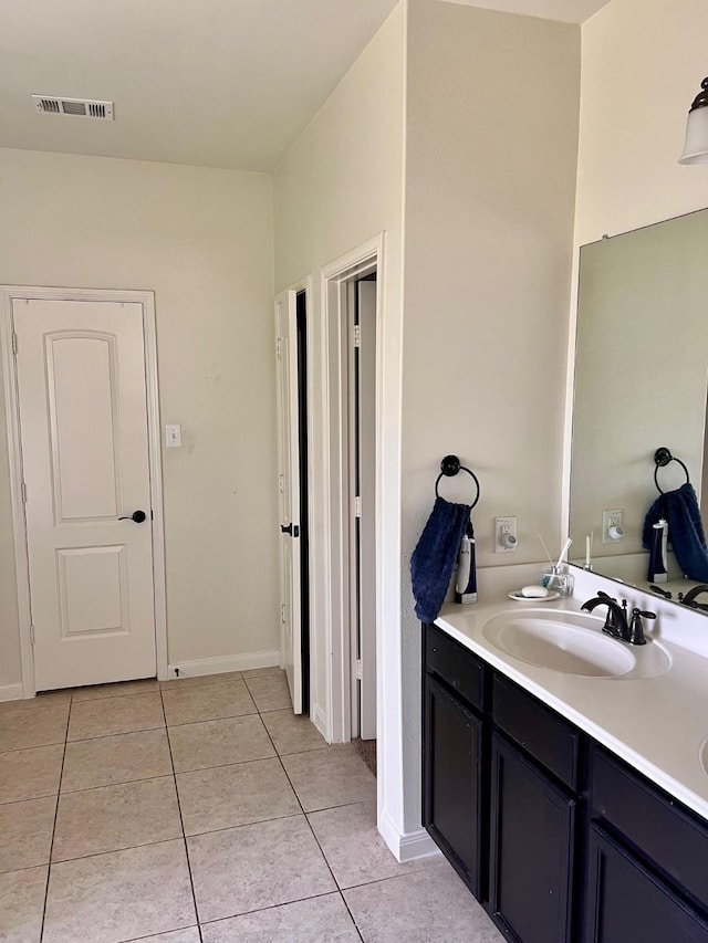 412 Lake St, Red Oak, TX 75154 - bathroom with double vanity and tile patterned flooring