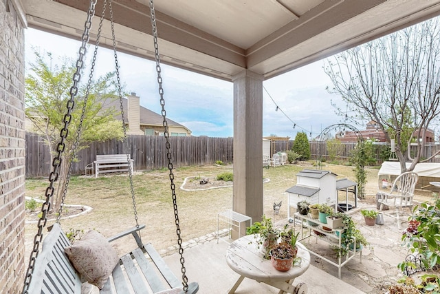412 Lake St, Red Oak, TX 75154 - fenced backyard with a patio area