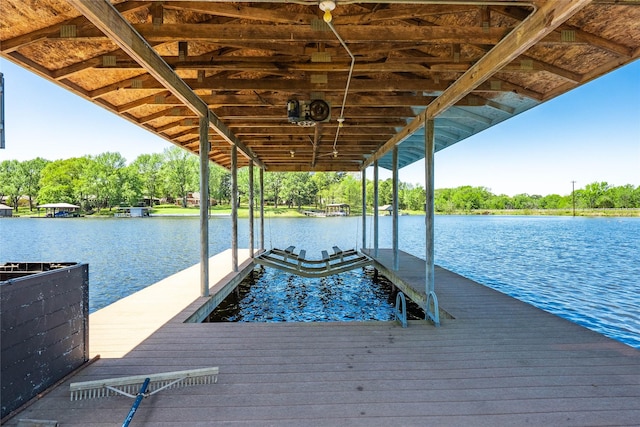 dock area featuring a water view and boat lift
