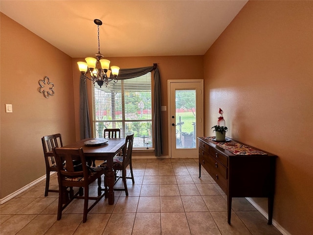 2610 Jakes Ct, Midlothian, TX 76065 - dining space featuring a chandelier, baseboards, and light tile patterned flooring