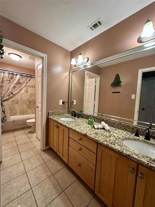 2610 Jakes Ct, Midlothian, TX 76065 - full bath featuring double vanity, tile patterned floors, toilet, and shower / bath combo with shower curtain