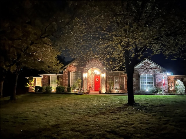 2610 Jakes Ct, Midlothian, TX 76065 - view of front facade with a yard and brick siding