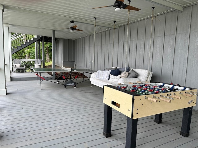 712 Camp Cypress Trl, Winnsboro, TX 75494 - wooden terrace with ceiling fan, outdoor dining space, and stairway