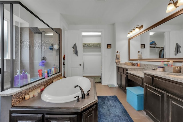 4024 Alpine Rose Ct, Roanoke, TX 76262 - full bathroom with a shower stall, a spacious closet, vanity, a garden tub, and tile patterned flooring