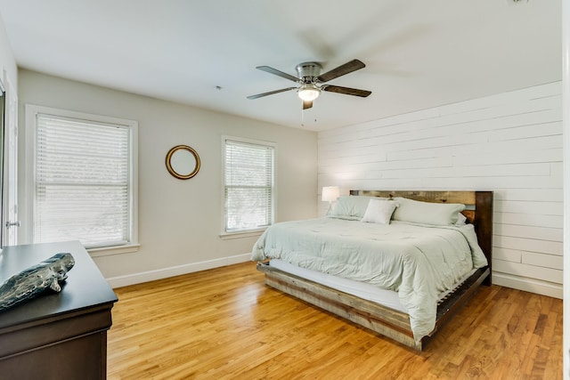 6345 Bordeaux Ave, Dallas, TX 75209 - bedroom featuring baseboards, light wood-style floors, and a ceiling fan