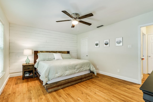 6345 Bordeaux Ave, Dallas, TX 75209 - bedroom with baseboards, visible vents, light wood-style floors, and ceiling fan
