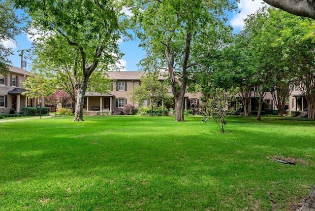 6345 Bordeaux Ave, Dallas, TX 75209 - view of home's community with a lawn