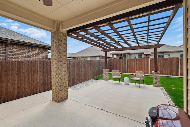 view of patio / terrace featuring a pergola and a fenced backyard