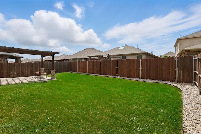 view of yard with a fenced backyard and a patio