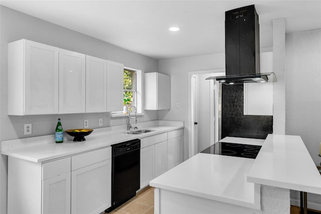 2416 Glacier St, Irving, TX 75062 - kitchen with black dishwasher, a sink, island exhaust hood, white cabinetry, and recessed lighting