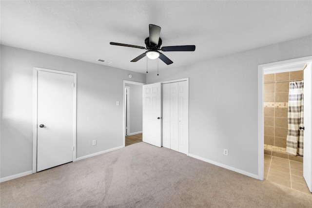 2416 Glacier St, Irving, TX 75062 - unfurnished bedroom featuring carpet, baseboards, and connected bathroom