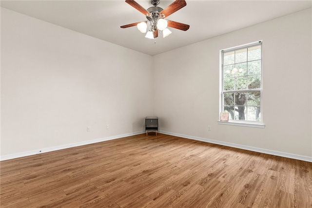 2800 Lomas Rodando Calzada, Kempner, TX 76539 - empty room with light wood finished floors and a ceiling fan