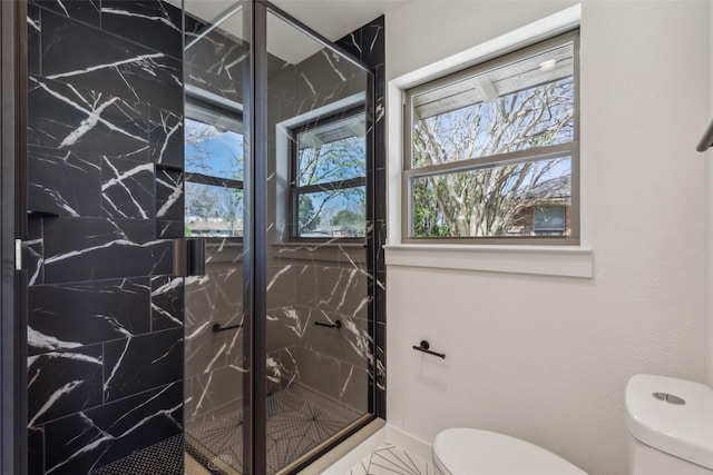 full bath with toilet and a marble finish shower