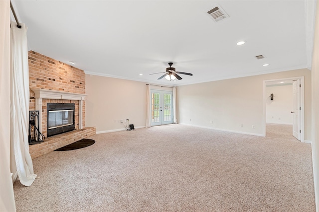 709 Verde Dr, Burleson, TX 76028 - unfurnished living room with ornamental molding, ceiling fan, carpet flooring, visible vents, and french doors