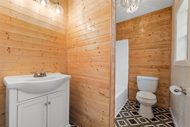 709 Verde Dr, Burleson, TX 76028 - full bathroom with toilet, wooden walls, a bath, and vanity