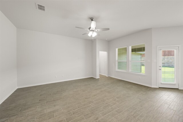 2608 Streamside Dr, Burleson, TX 76028 - spare room featuring ceiling fan and wood finished floors