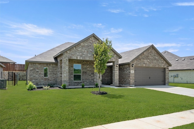 2608 Streamside Dr, Burleson, TX 76028 - french country home with brick siding, an attached garage, and driveway