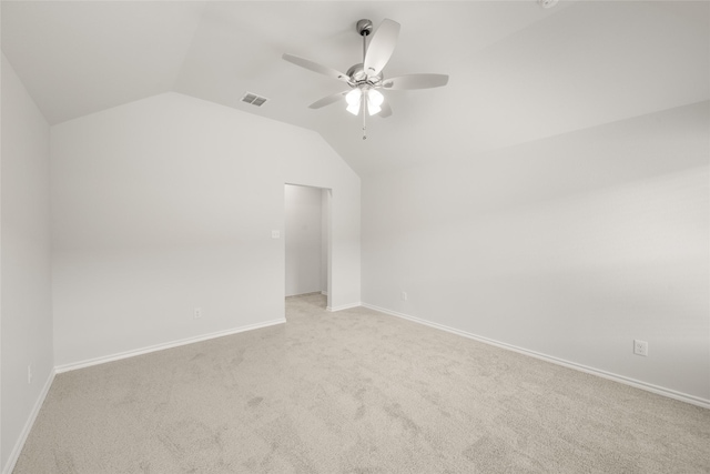 2608 Streamside Dr, Burleson, TX 76028 - unfurnished room with vaulted ceiling, light carpet, and a ceiling fan