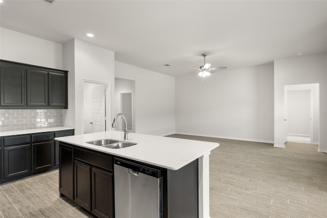 2608 Streamside Dr, Burleson, TX 76028 - kitchen with stainless steel dishwasher, a ceiling fan, light countertops, decorative backsplash, and light wood-style floors