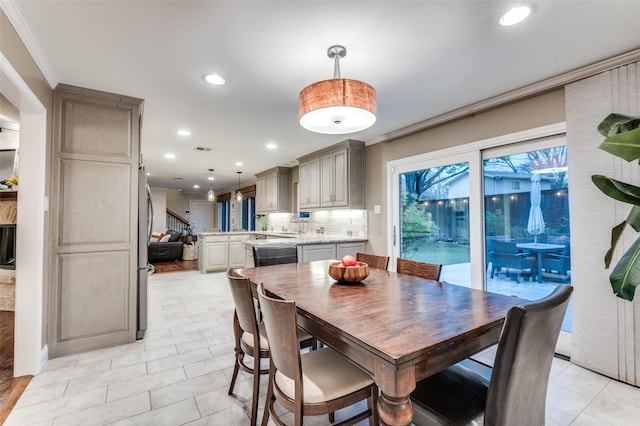 dining room with visible vents, crown molding, recessed lighting, and light tile patterned floors