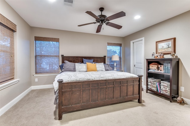 bedroom featuring recessed lighting, baseboards, visible vents, a ceiling fan, and light carpet