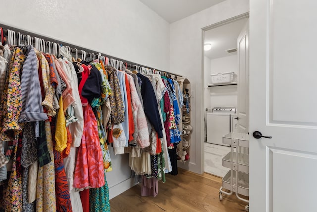 3644 Platte River Trl, Prosper, TX 75078 - spacious closet with wood finished floors and washer and dryer