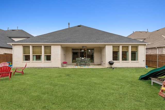 3644 Platte River Trl, Prosper, TX 75078 - back of house with brick siding, fence private yard, and a shingled roof