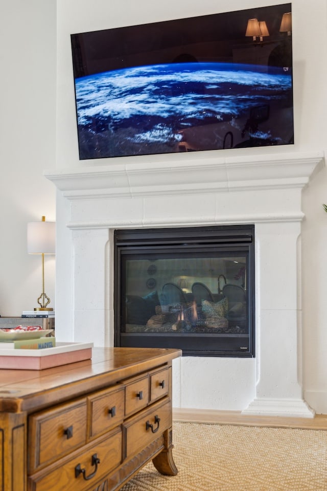 3644 Platte River Trl, Prosper, TX 75078 - details featuring a glass covered fireplace