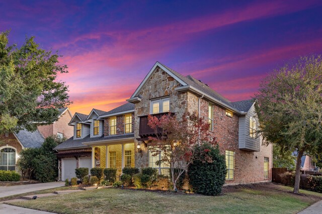 8105 Ryder Ct, Mckinney, TX 75072 - doorway to property with brick siding, stone siding, and covered porch