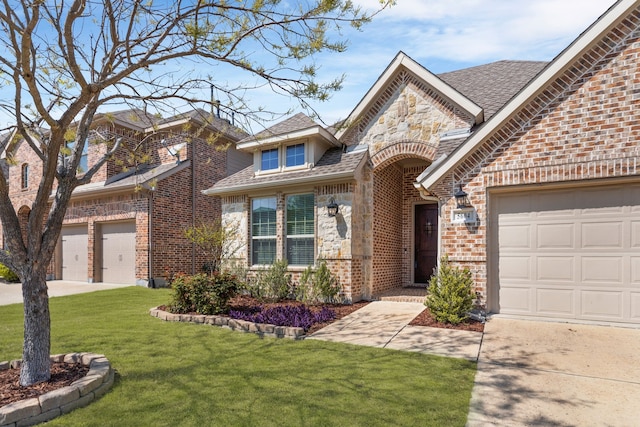 5604 Datewood Ln, Mckinney, TX 75071 - view of front of house with a garage, a front yard, driveway, stone siding, and brick siding