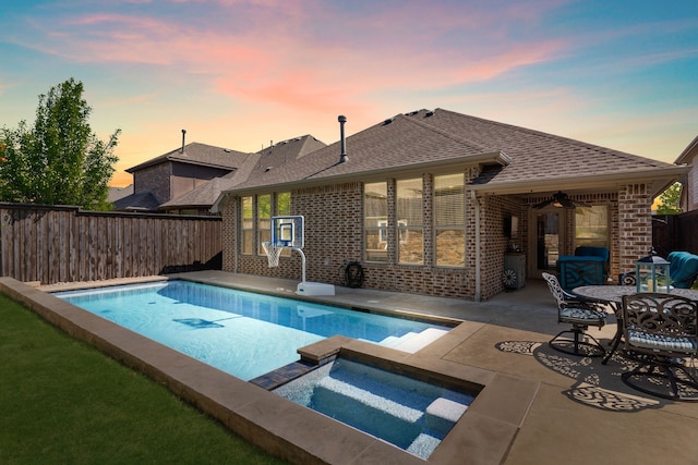 5604 Datewood Ln, Mckinney, TX 75071 - view of swimming pool with a patio, a fenced backyard, and a pool with connected hot tub