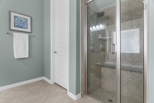 5604 Datewood Ln, Mckinney, TX 75071 - bathroom featuring a stall shower, tile patterned flooring, and baseboards