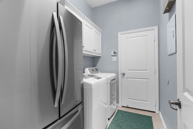 5604 Datewood Ln, Mckinney, TX 75071 - washroom with washing machine and dryer, cabinet space, light tile patterned floors, and baseboards