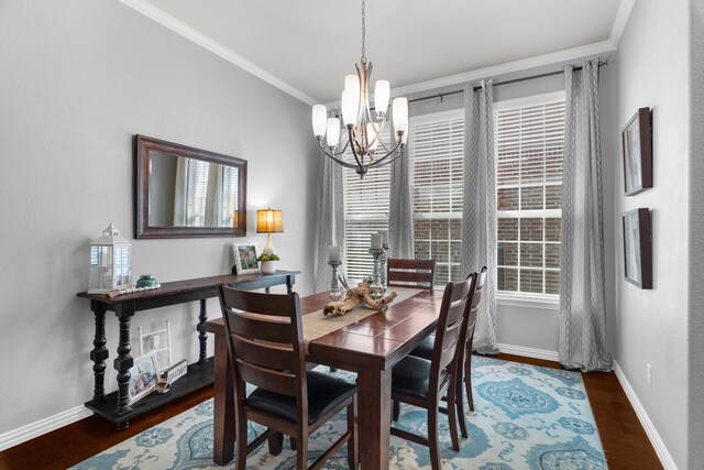 5604 Datewood Ln, Mckinney, TX 75071 - dining space featuring a chandelier, ornamental molding, baseboards, and wood finished floors