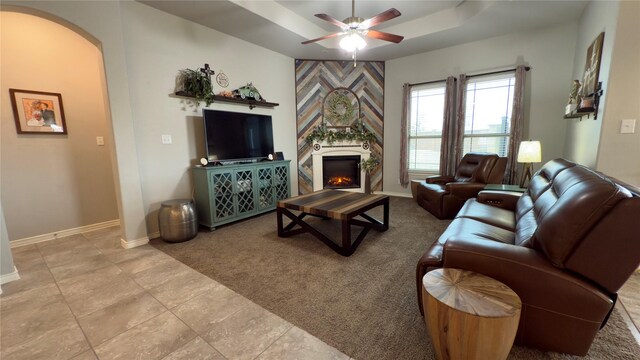 carpeted bedroom with baseboards and ceiling fan