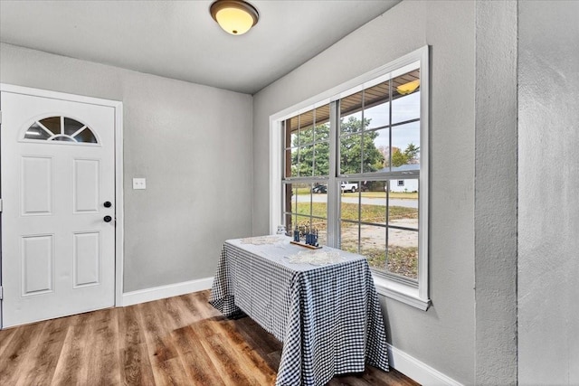 736 W Bullock Dr, Denison, TX 75020 - entryway featuring wood finished floors and baseboards