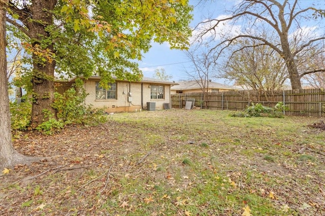 736 W Bullock Dr, Denison, TX 75020 - fenced backyard with central air condition unit
