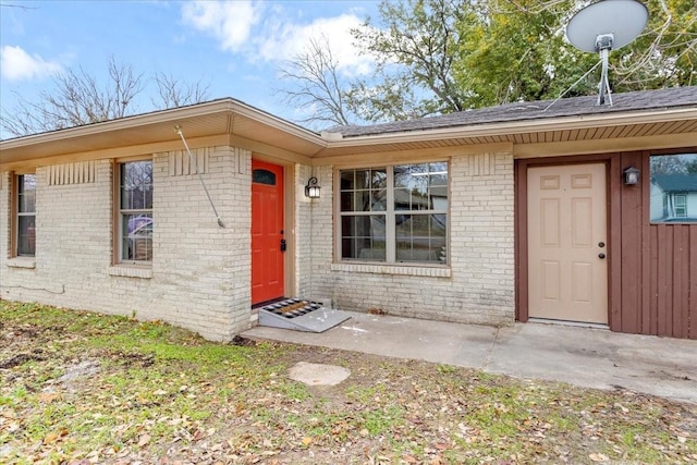 736 W Bullock Dr, Denison, TX 75020 - doorway to property with brick siding