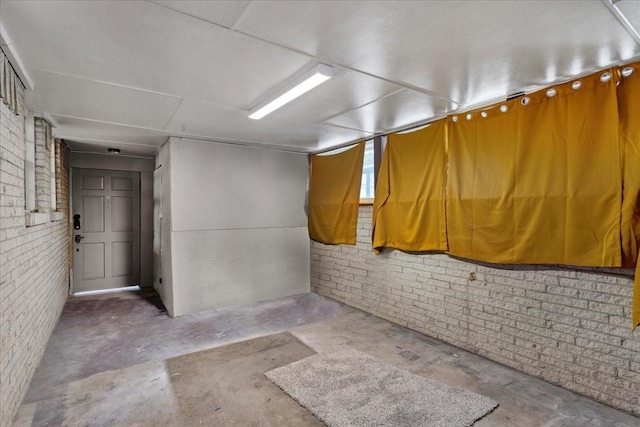 736 W Bullock Dr, Denison, TX 75020 - finished basement featuring brick wall