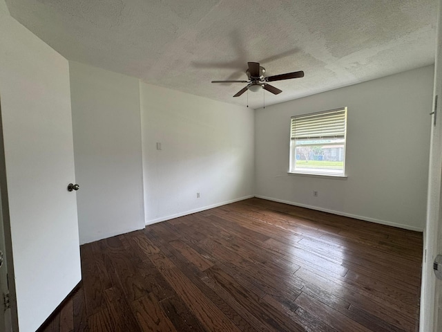 unfurnished room featuring hardwood / wood-style flooring, baseboards, a textured ceiling, and ceiling fan