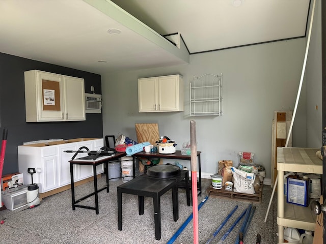home office with baseboards and a wall mounted air conditioner