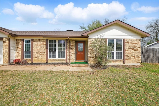 5912 Oregon Trl Ct, Haltom City, TX 76148 - single story home featuring brick siding, fence, and a front lawn