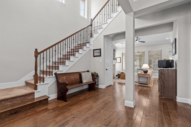 7501 Kickapoo Dr, Mckinney, TX 75070 - foyer featuring stairway, baseboards, a ceiling fan, and dark wood-style floors