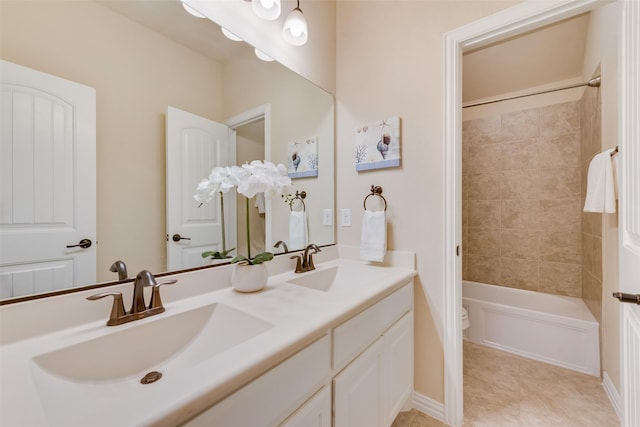 9836 Arctic Dr, Frisco, TX 75035 - full bathroom featuring toilet, double vanity, baseboards, bathing tub / shower combination, and tile patterned floors