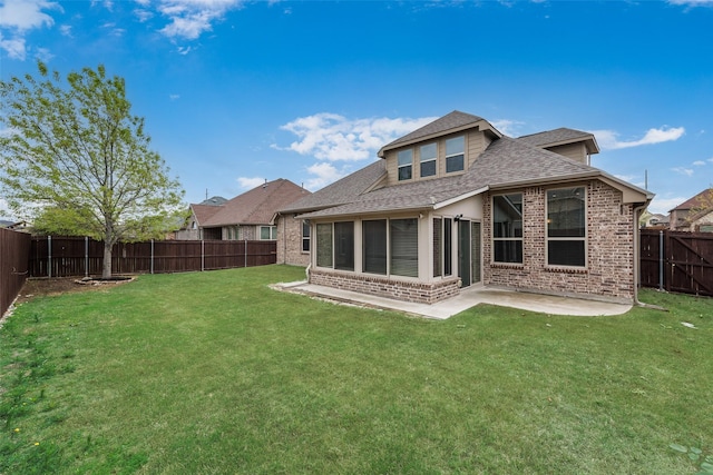 9836 Arctic Dr, Frisco, TX 75035 - back of property with brick siding, a patio, and a shingled roof