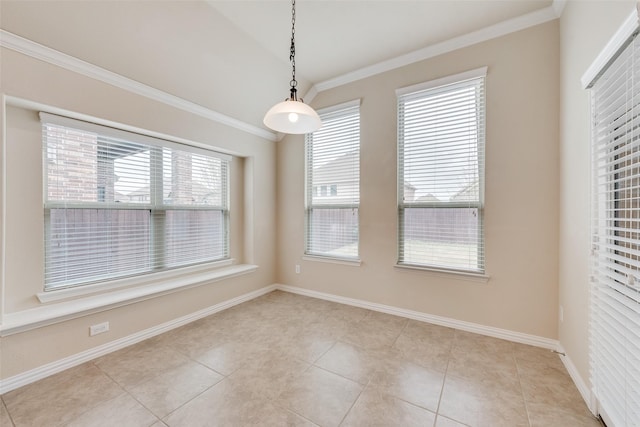 9836 Arctic Dr, Frisco, TX 75035 - unfurnished dining area featuring crown molding, baseboards, and light tile patterned floors