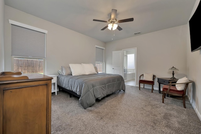 560 Camber St, Saginaw, TX 76131 - bedroom with ceiling fan, ensuite bathroom, visible vents, light carpet, and baseboards