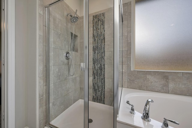 560 Camber St, Saginaw, TX 76131 - bathroom featuring a bath and a stall shower