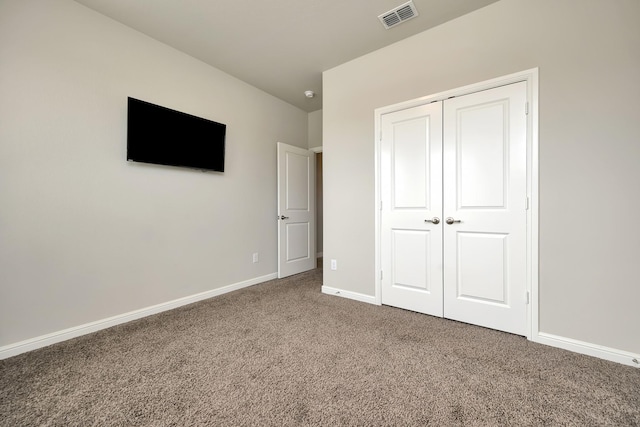 560 Camber St, Saginaw, TX 76131 - unfurnished bedroom featuring a closet, visible vents, baseboards, and carpet floors