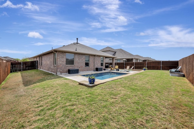 560 Camber St, Saginaw, TX 76131 - rear view of property featuring a yard, a fenced backyard, a patio, brick siding, and a fenced in pool